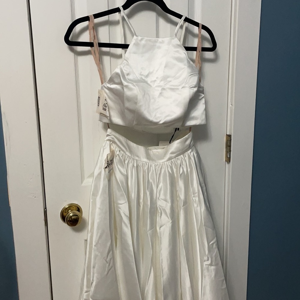 White satin Fame and Partners crop skirt set.